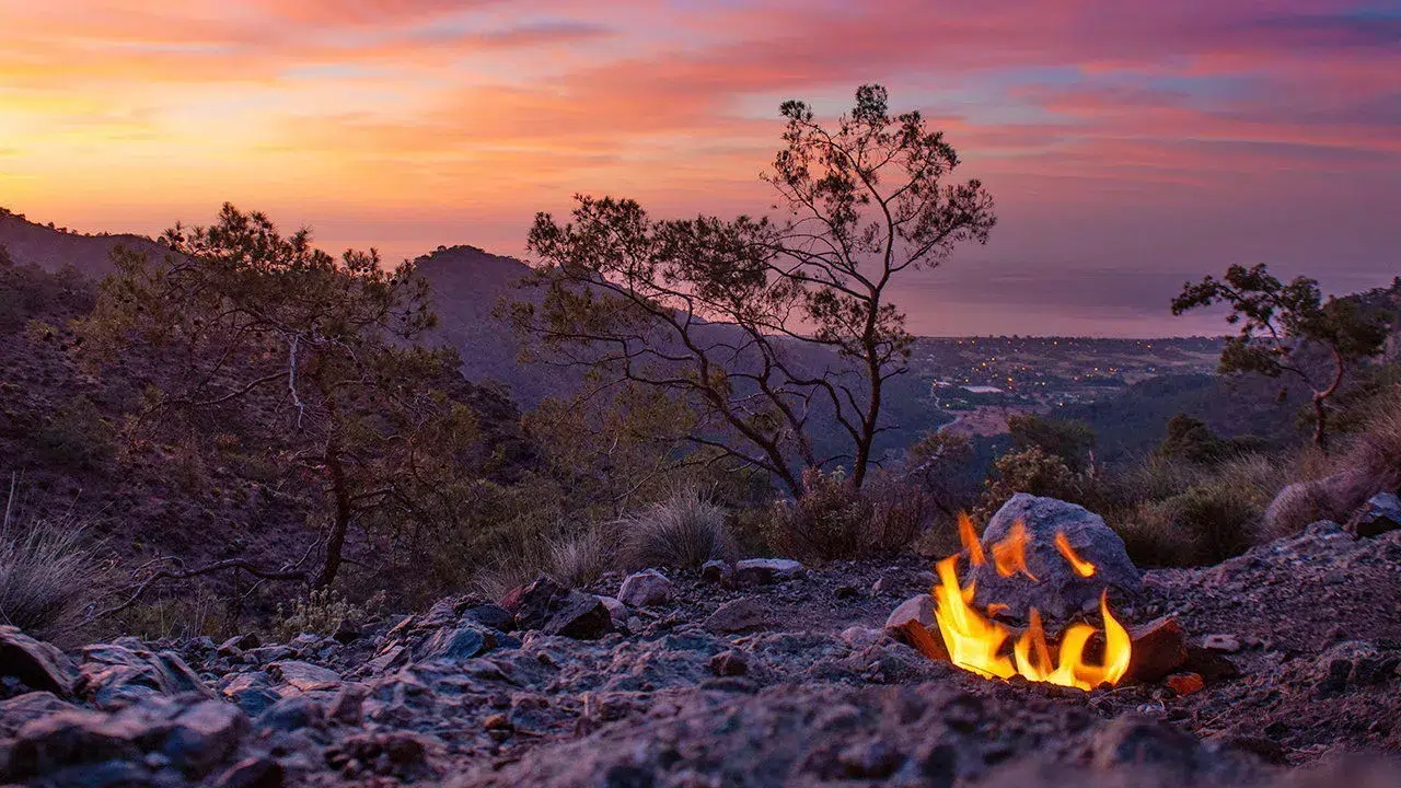 Campsite on mountain at dusk